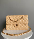 Flap bag jumbo 23 light beige grain caviar cowhide silver hardware