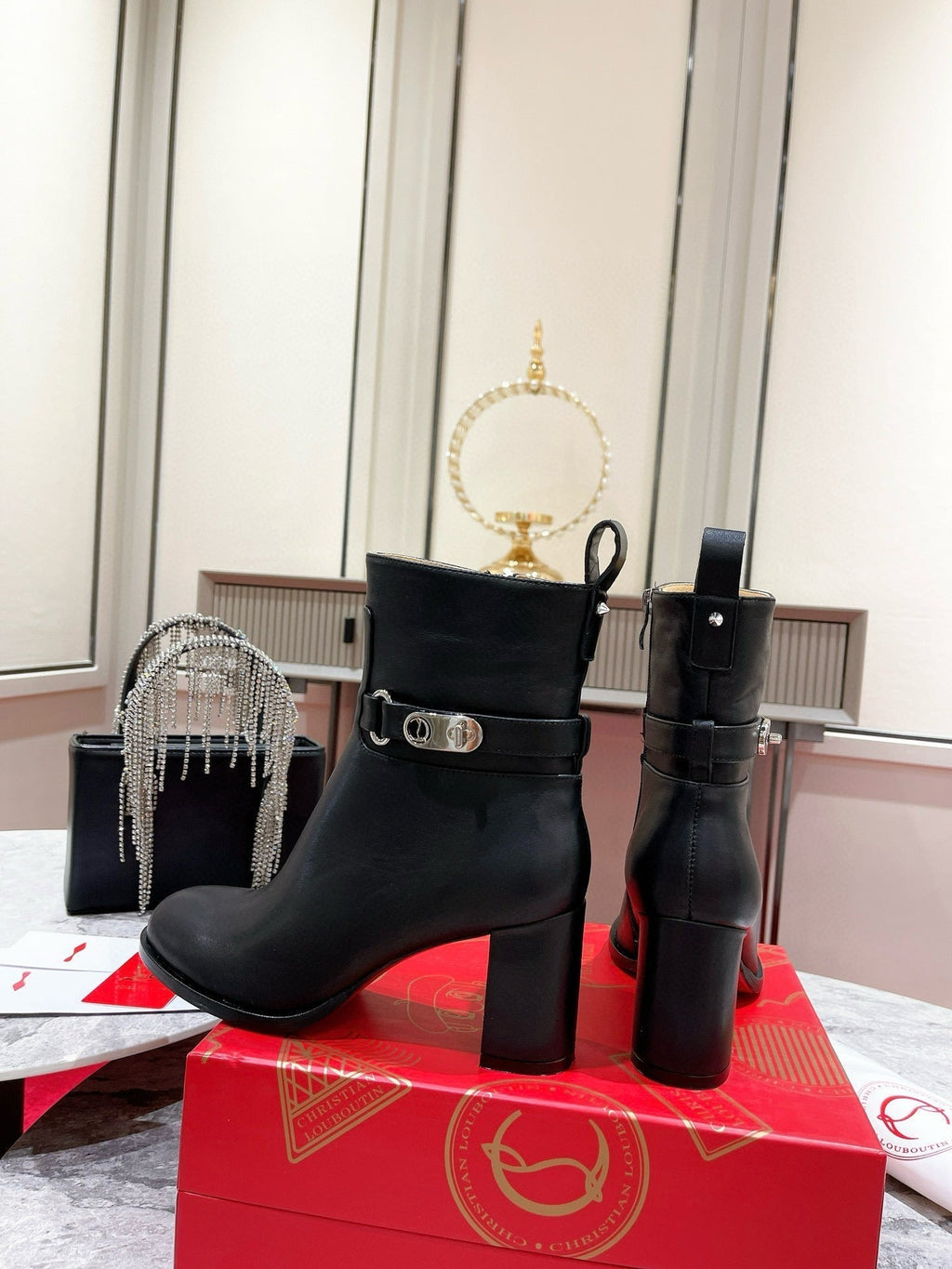 CL Turn-Lock Buckle Red Sole Booties Black Calfskin