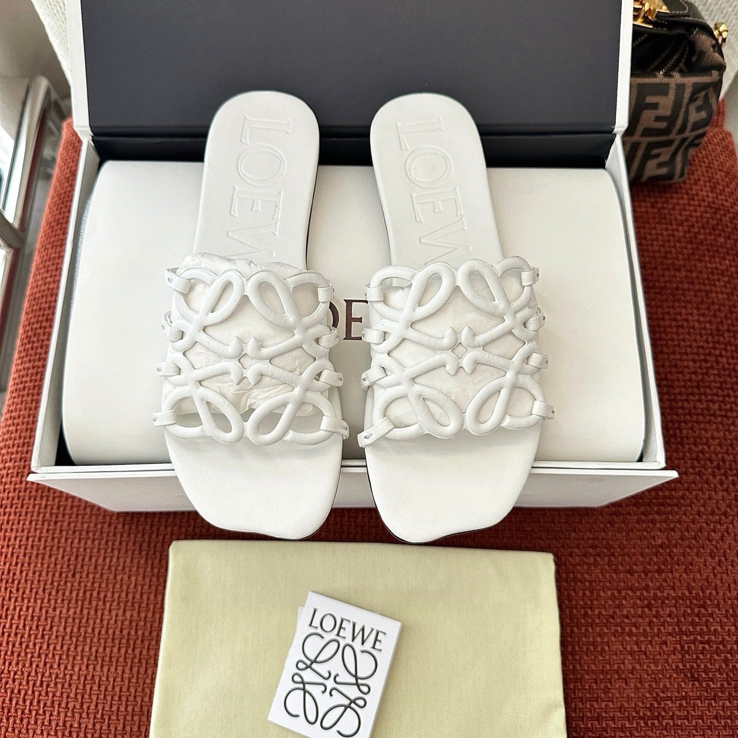 Loewe 25 Petal Anagram Slides White Cowhide