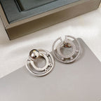 CREOLES MOVE ROMANE PAVED SILVER DIAMOND EARRINGS