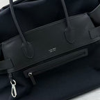 The Row Margaux 17 Inside Out Black Canvas & Leather