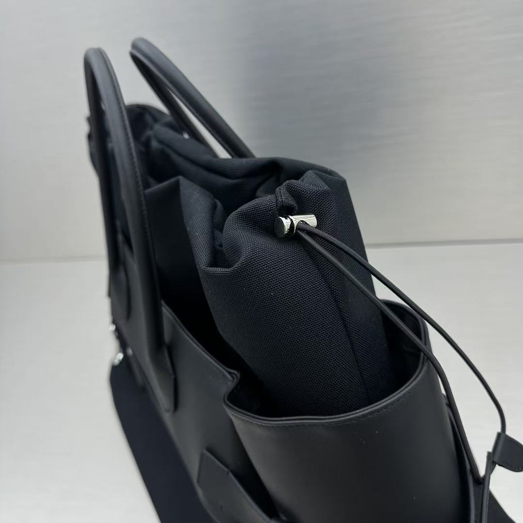 The Row Margaux 17 Inside Out Black Canvas & Leather