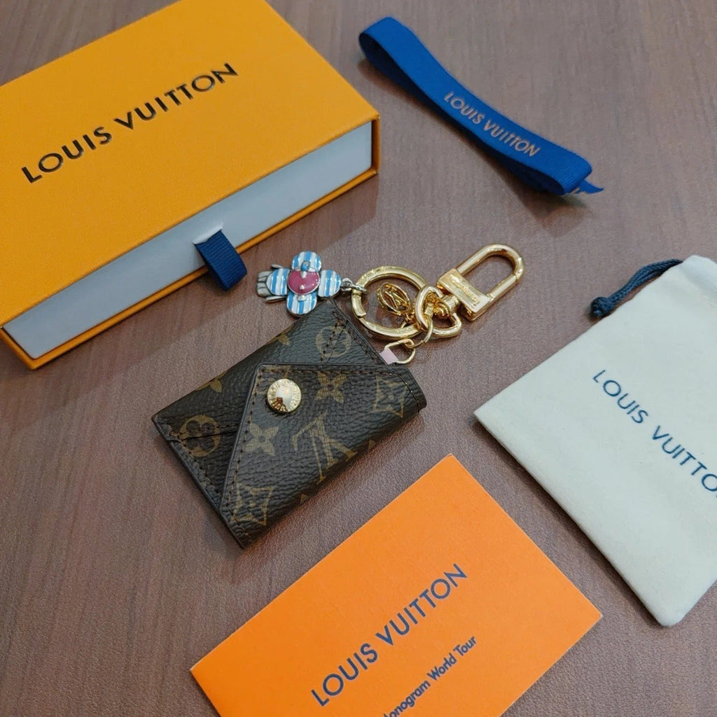 LV Brown Bag Charm With Blue Flower