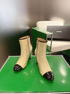 Chanel 2025𝐒𝐒 High Heeled Ankle Boots Light Beige & Black Glossy Leather 507545