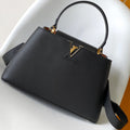 CAPUCINES GM 33CM BLACK GOLD TAURILLON LEATHER 252021