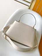 CAPUCINES GM 33CM BEIGE GOLD TAURILLON LEATHER 252023