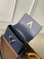 Twist MM Slim 23cm Dark Blue Calfskin 251410