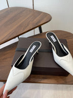 Alaia 26  Pointed-toe Mules 50 White Black Sheepskin 624913