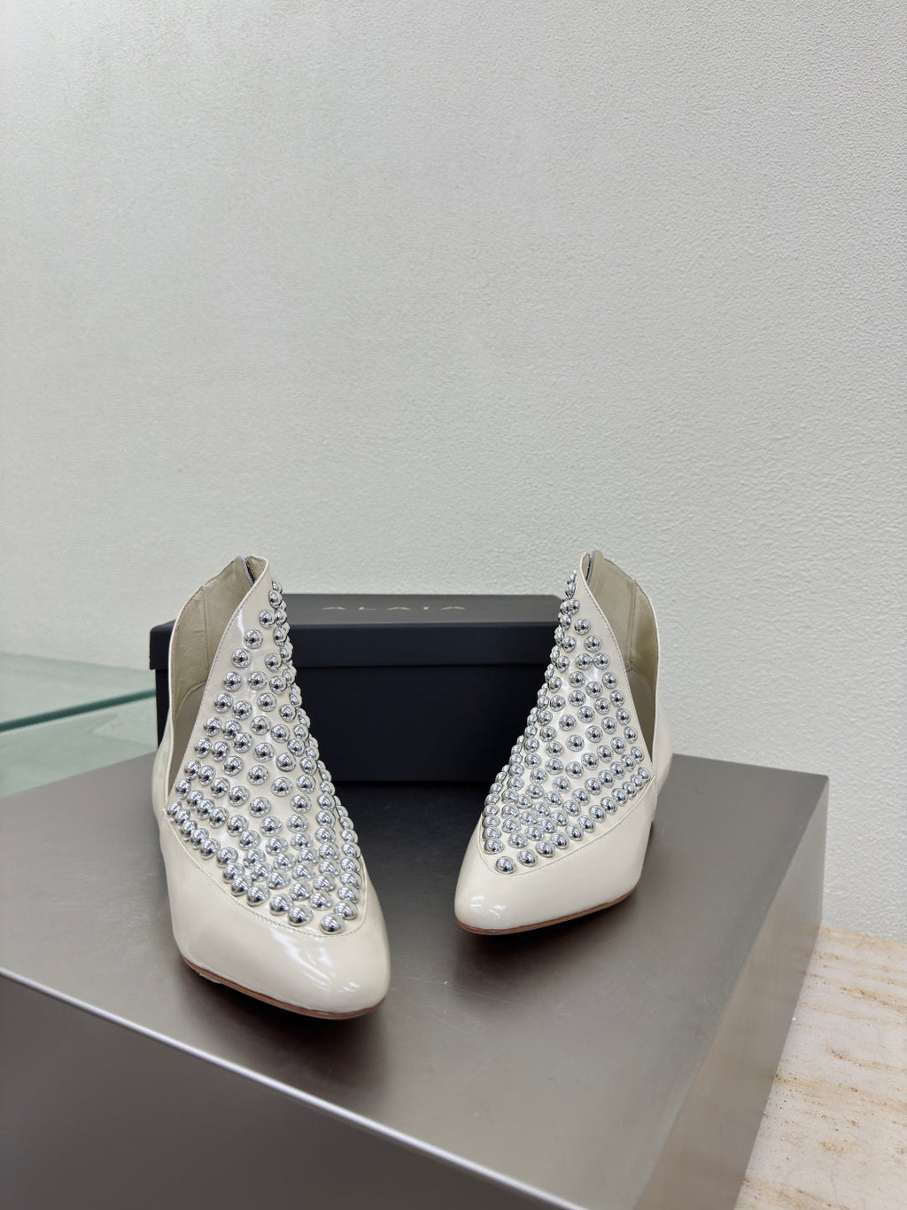 ALAIA Rivet ankle boots ivory cowhide leather 471092