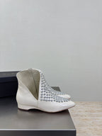 ALAIA Rivet ankle boots ivory cowhide leather 471092