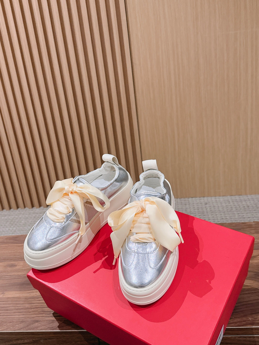 Ferragamo Bow Platform Sneaker Sliver Satin Sheepskin