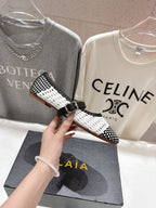 ALAIA MARY JANE FLATS white mix black woven calfskin pattent