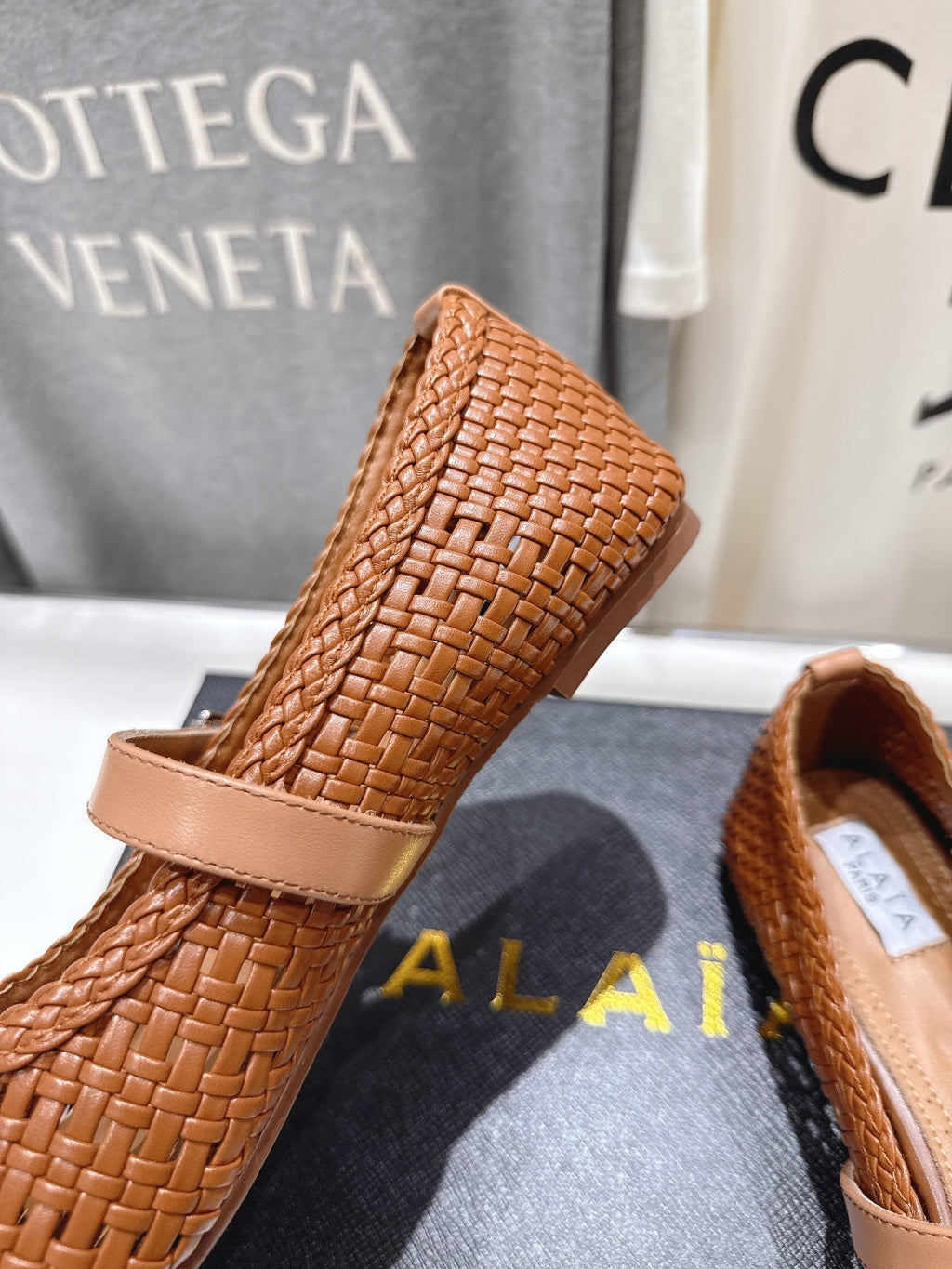 ALAIA MARY JANE FLATS brown woven calfskin pattent