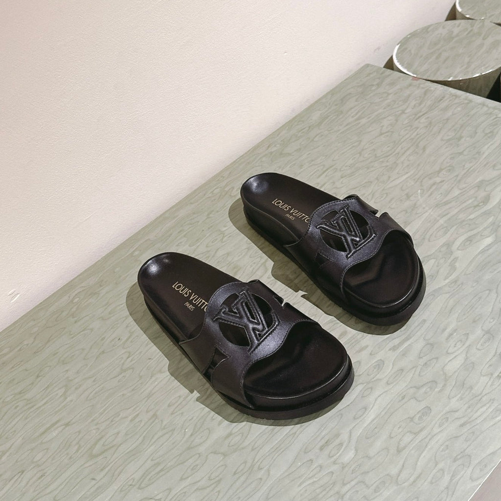 lv sandal isola flat mule black calfskin