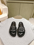 lv sandal isola flat mule black calfskin