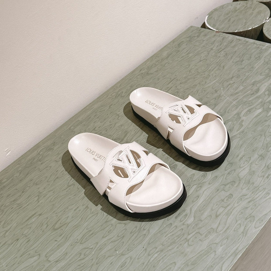 lv sandal isola flat mule cream calfskin