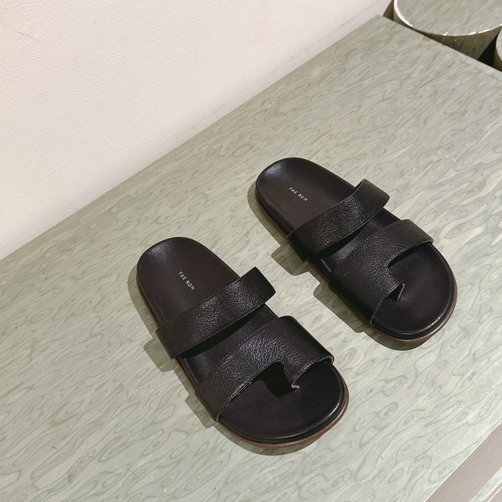 The Row Hugh Slides Black Cowhide Rubber 451281