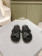 The Row Hugh Slides Black Cowhide Rubber 451281