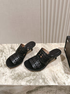 Alaia 2025 Vienne Cutout Kitten-Heel Slide Sandals Black Leather 293648