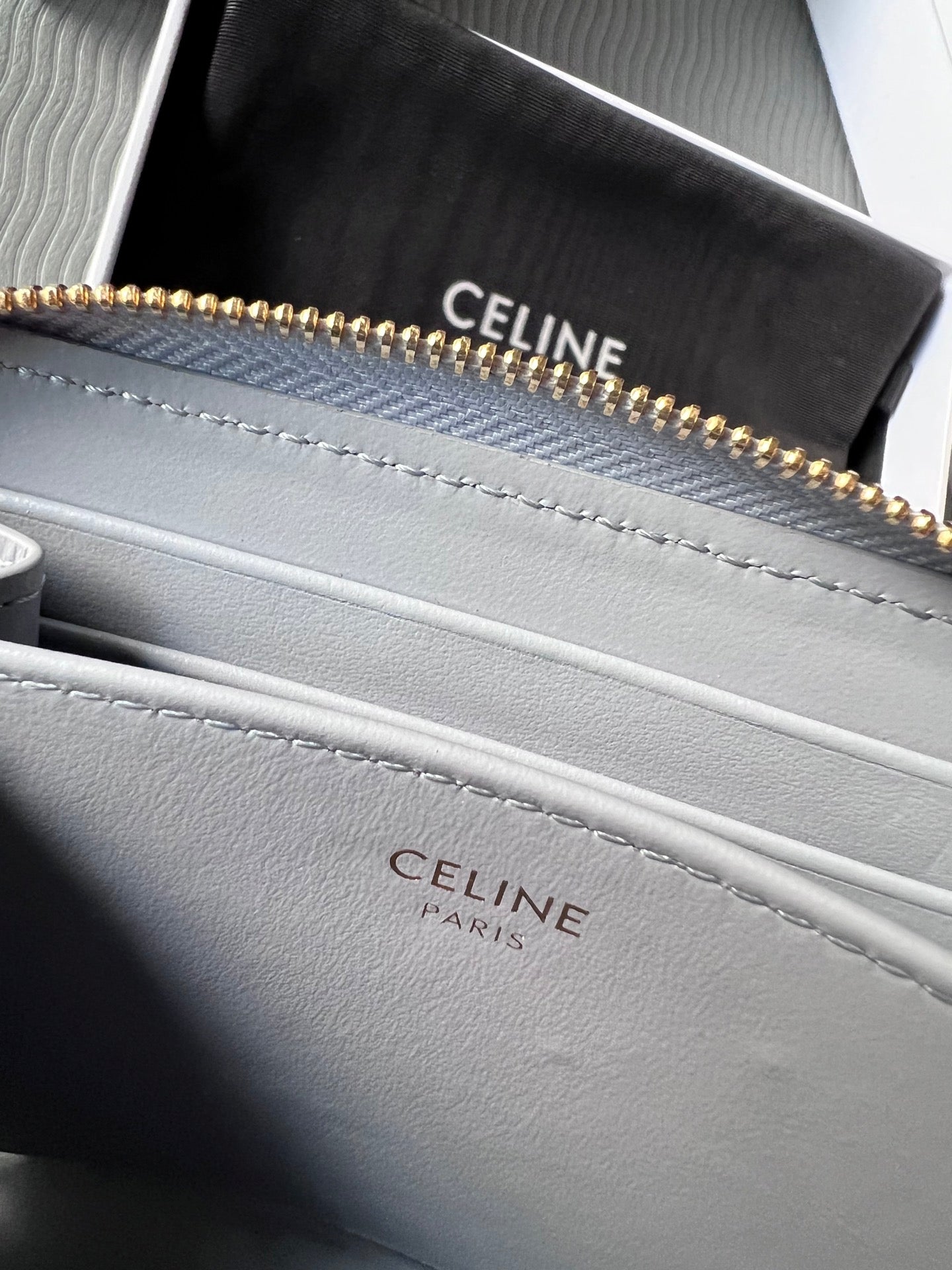 TRIOMPHE Compact Zipped Wallet Glacier Cowhide Leather