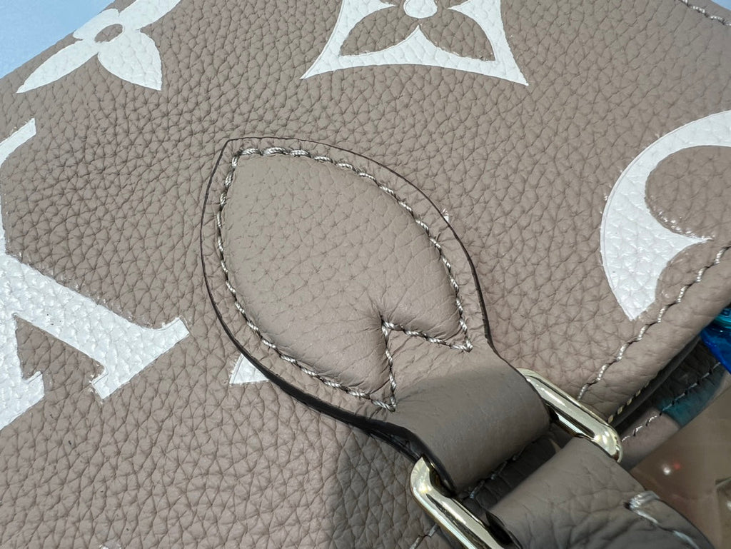onthego 25 east west da bicolor monogram empreinte