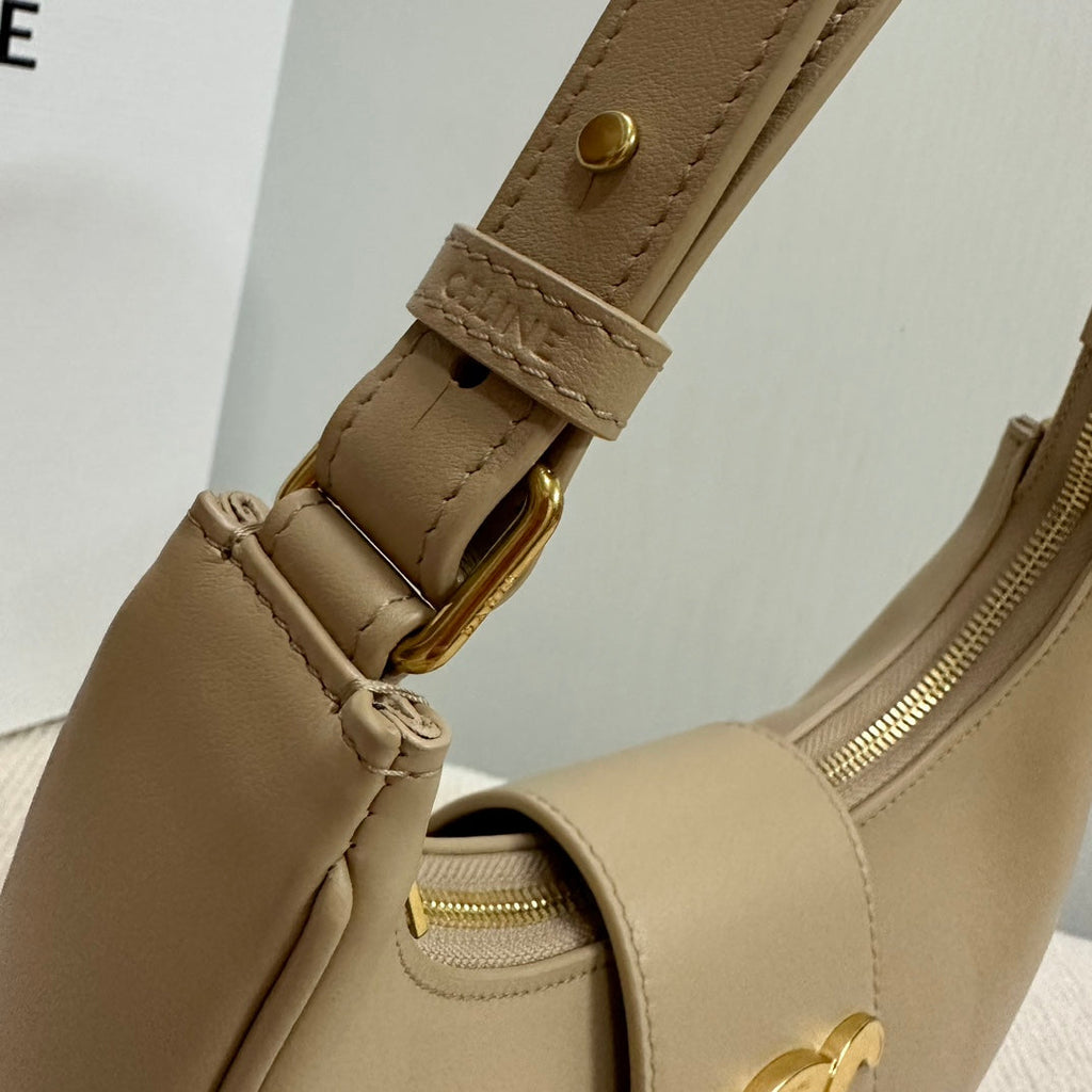 MEDIUM AVA BAG 23 IN DOMINO SMOOTH CALFSKIN GOLD LOGO