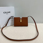 16 STRAP POCHETTE 18 IN BRONZE ORANGE SUPPLE CALFSKIN GOLD HARDWARE