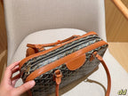 SAINT MARTIN BAG 35 IN BROWN GOYARDINE CANVAS AND CALFSKIN