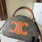HALF MOON CASE 18 IN BLACK TRIOMPHE CANVAS AND BRONZE BROWN CALFSKIN