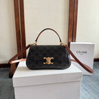 TEEN LOLA 20 IN BLACK TRIOMPHE CANVAS GOLD HARDWARE