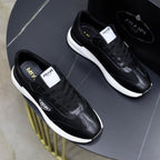 PRA SNEAKER IN BLACK CALFSKIN AND MESH FABRIC