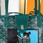 ANJOU MINI BAG 20 IN GREEN GOYARDINE CANVAS AND CALFSKIN WITH CARTOON PATCH