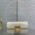 FLAP BAG 18 IN WHITE PATENT CALFSKIN