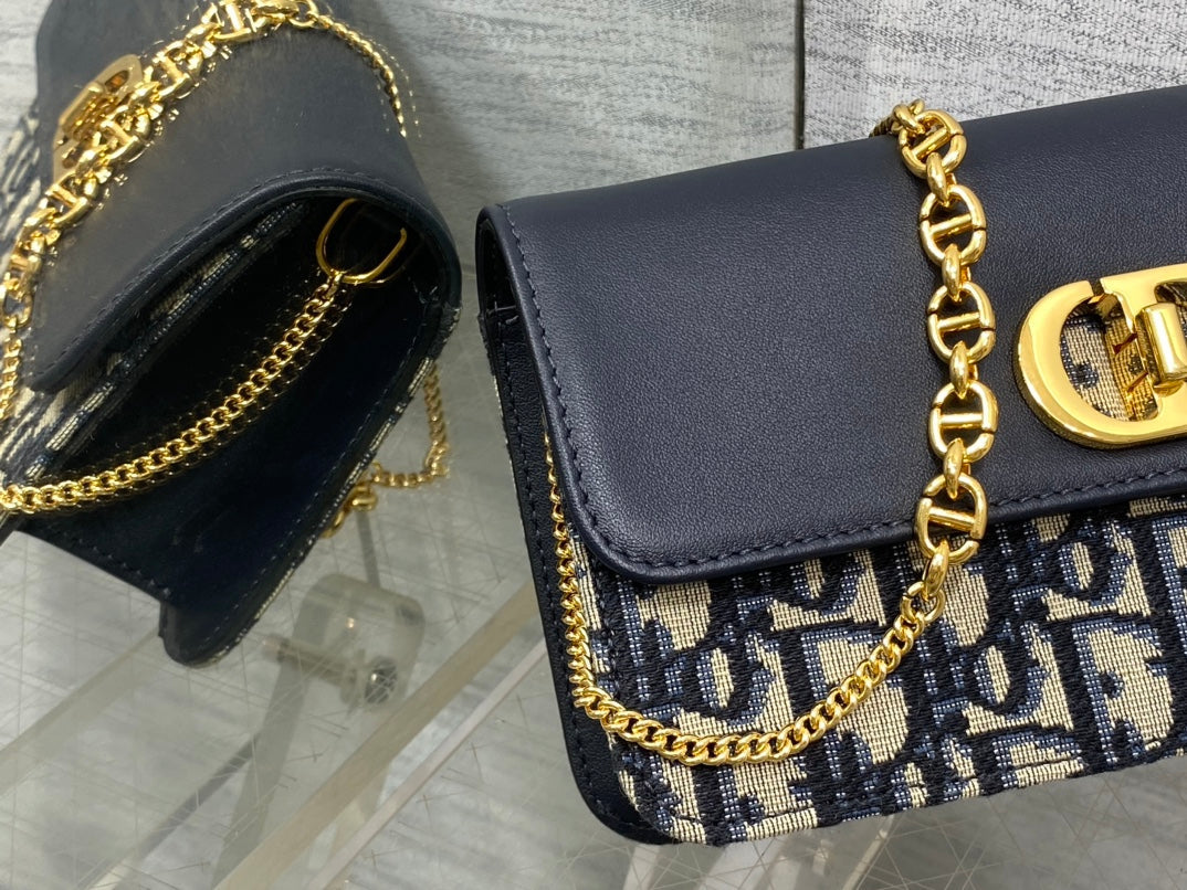 MONTAIGNE AVENUE MINI 22 BAG IN NAVY BLUE CALFSKIN AND MONOGRAM OBLIQUE JACQUARD