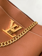 LV Lock and Walk Bag Brown Gold Cowhide 241222