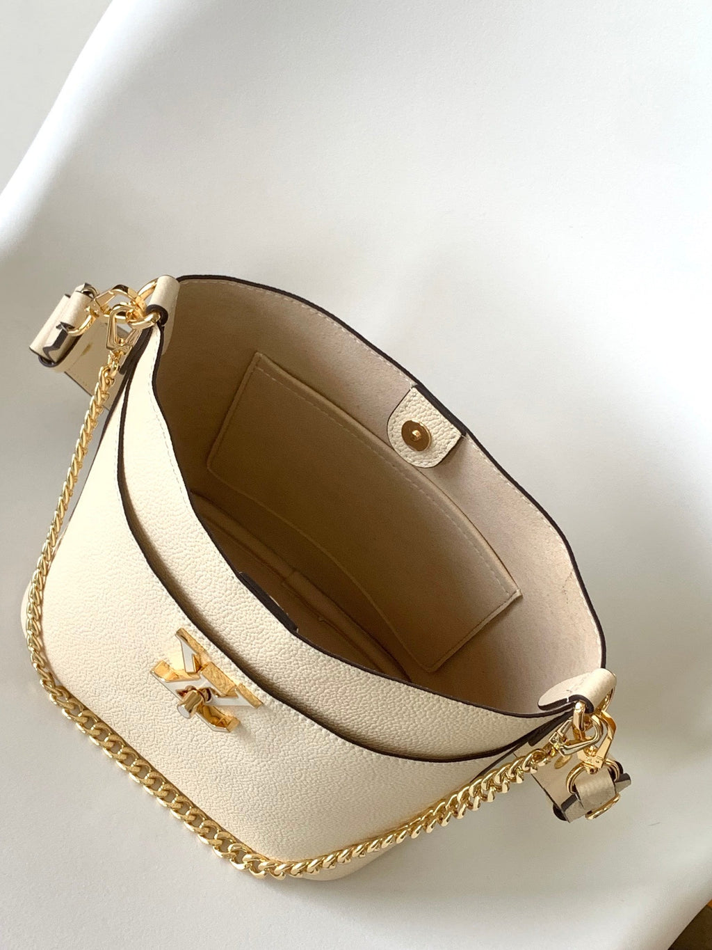 LV Lock and Walk Bag White Gold Cowhide 241224