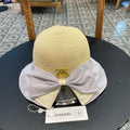 BOW BUCKET HAT IN PALE PURPLE MIX BEIGE RAFFIA 426169