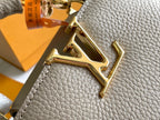CAPUCINES MINI 21 DARK BEIGE TAURILLON GOLD HARDWARE