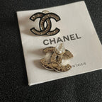 DOUBLE C STUD EARRINGS IN SILVER METAL WITH BLACK OUTLINE AND CRYSTALS INSIDE