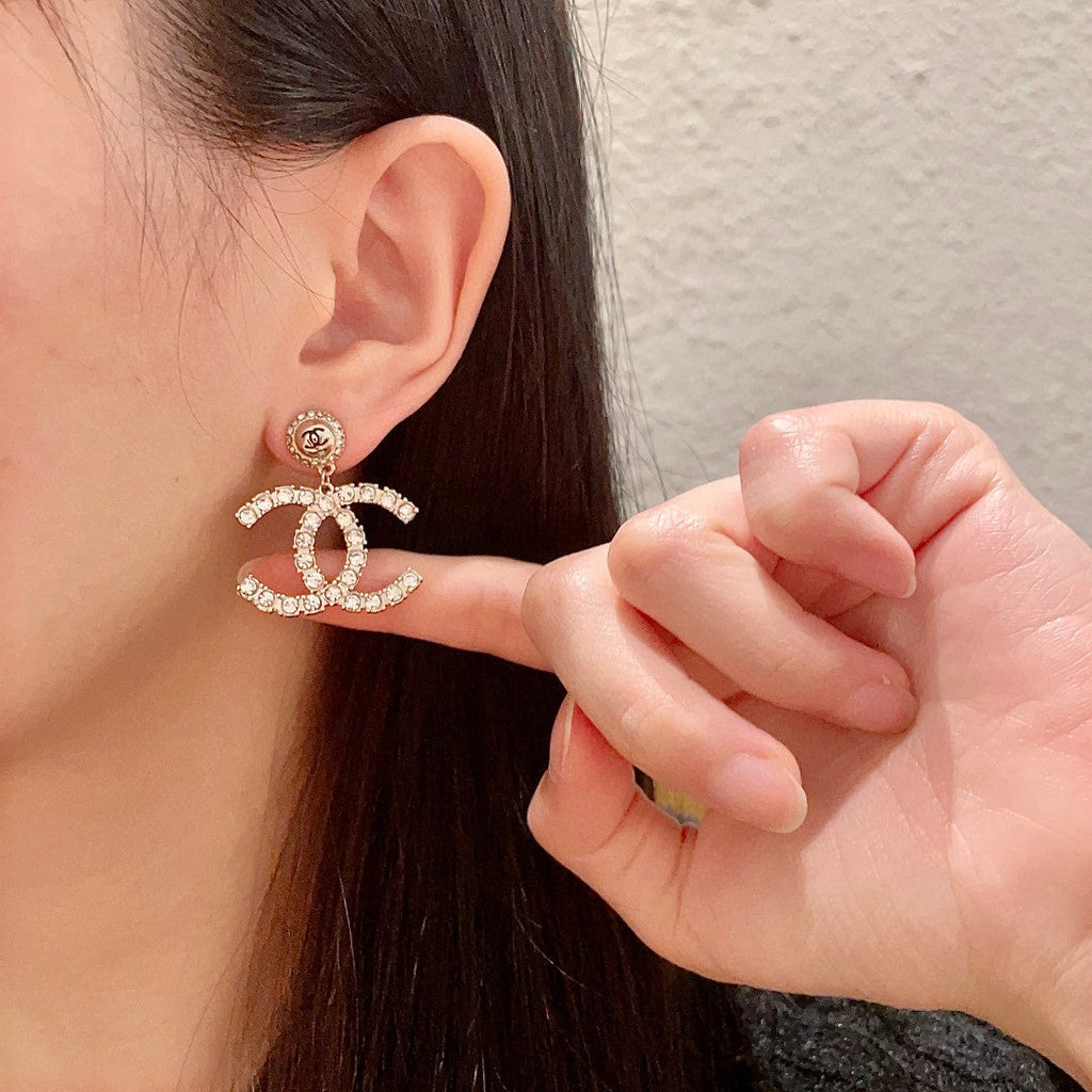 DOUBLE C STUD EARRINGS IN GOLD METAL FULLY EMBELLISHED CRYSTALS
