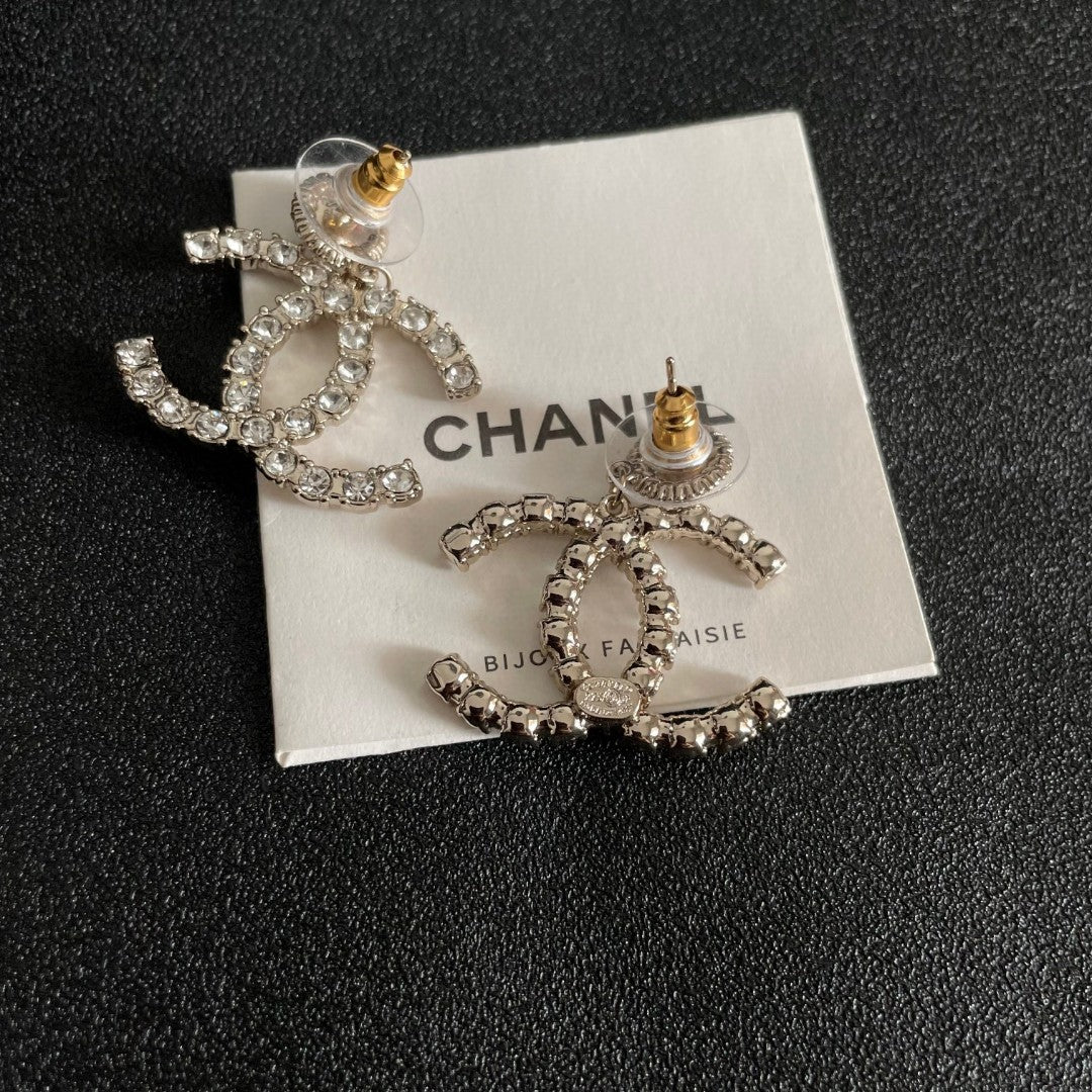 DOUBLE C STUD EARRINGS IN GOLD METAL FULLY EMBELLISHED CRYSTALS