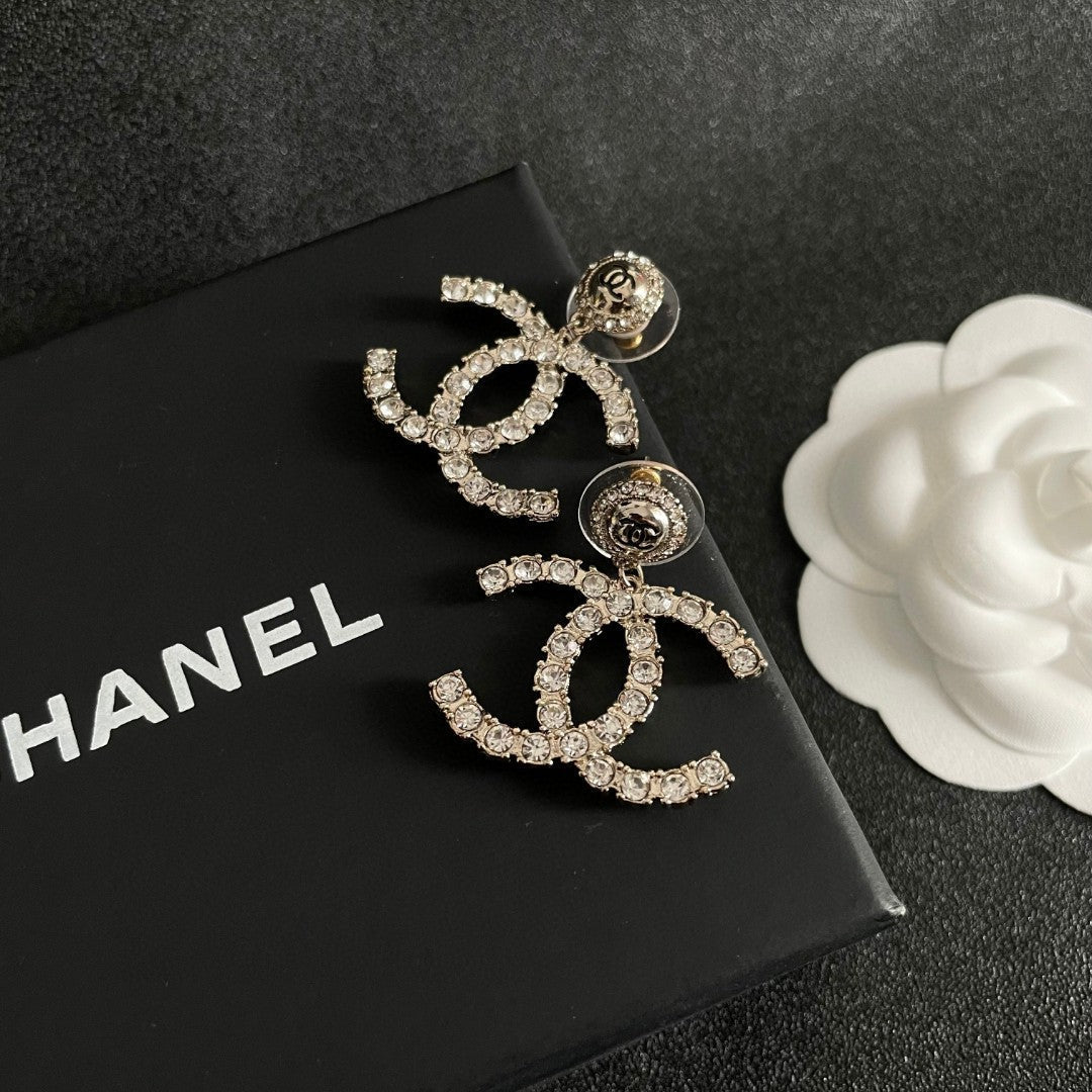 DOUBLE C STUD EARRINGS IN GOLD METAL FULLY EMBELLISHED CRYSTALS