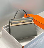hm kelly 32cm grey togo leather gold hardware