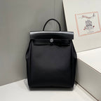 HERBAG A DOS ZIP RETOURNE BACKPACK 29 IN BLACK CANVAS AND CALFSKIN