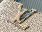 capucines nano 16 beige cloud blue taurrilon leather gold hardware