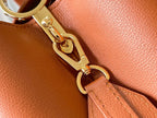 CAPUCINES GM 38CM BROWN ORANGE TAURILLON LEATHER