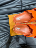 LV OASIS MULE IN CARROT ORANGE CALFSKIN
