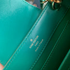 CAPUCINES MINI 21 GREEN CROCODILE EMBOSSED CALFSKIN GOLD HARDWARE