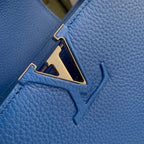 capucines mm 31.5 cobalt blue taurillon leather gold hardware
