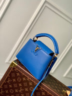 CAPUCINES MINI 21 COBALT BLUE TAURILLON GOLD HARDWARE